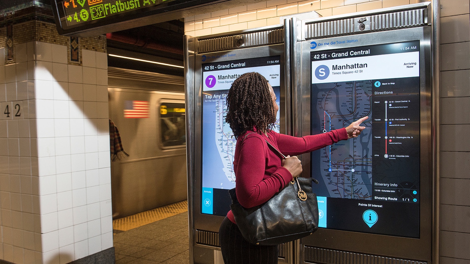 MTA riders using kiosk